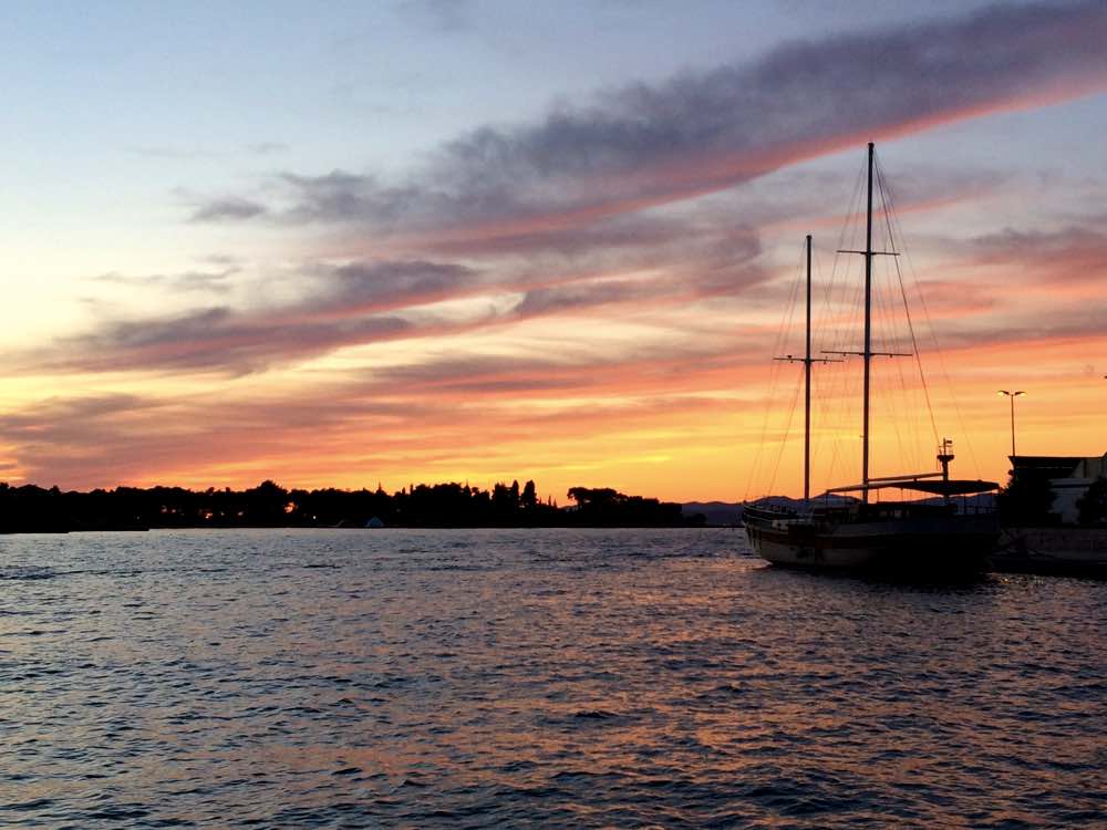 the island of Brac and Zlatni Rat beach - Supetar sunset