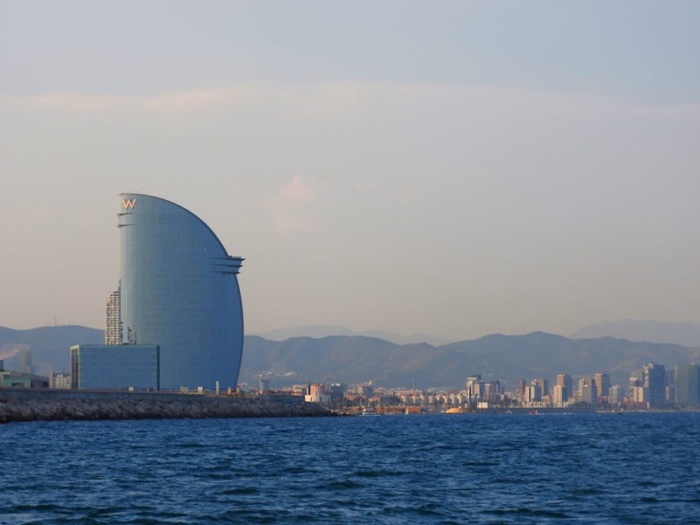 boat trip sunset barcelona w hotel skyline