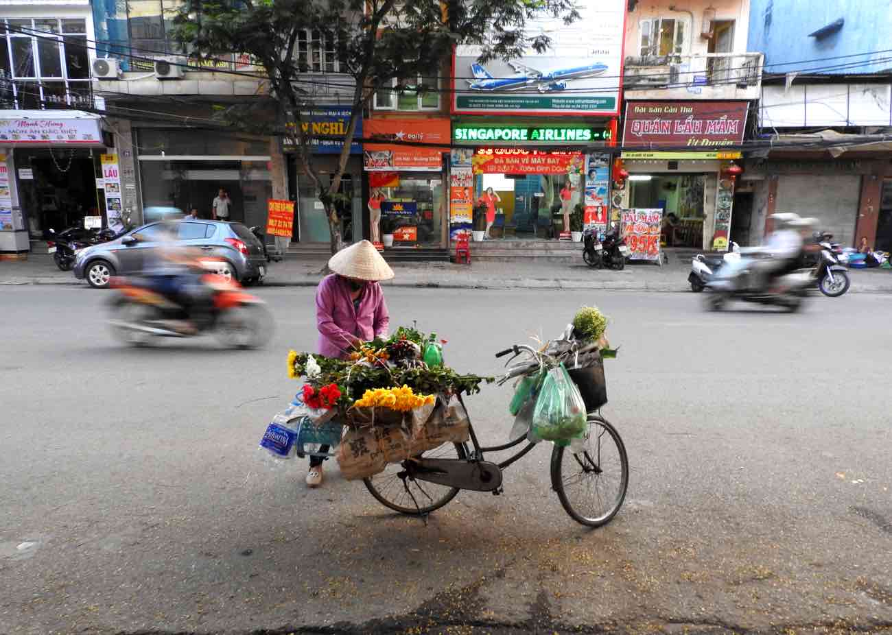 hanoi vs ho chi minh city saigon comparison better travel street shopping